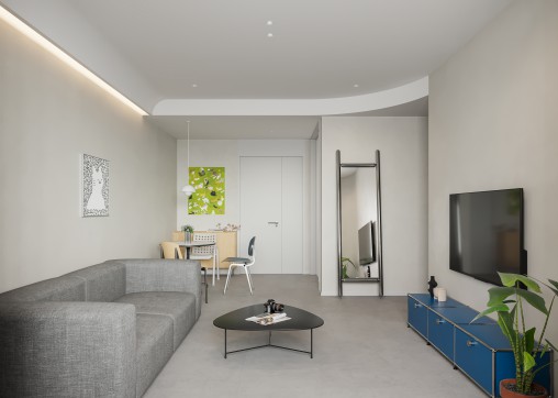 Modern living room and dining room interior scene