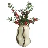 Decorative floral arrangement with red berries and green foliage in a sculptural vase (Skimmia) - Thumbnail 3